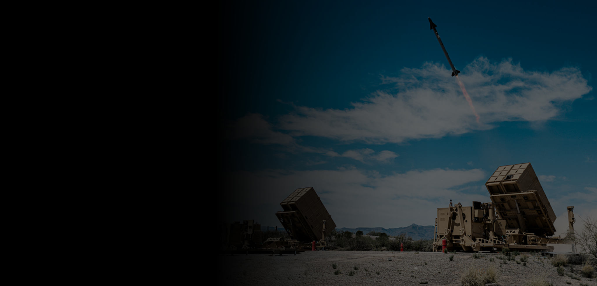 Website banner with dark gradient and missile launching in the background.